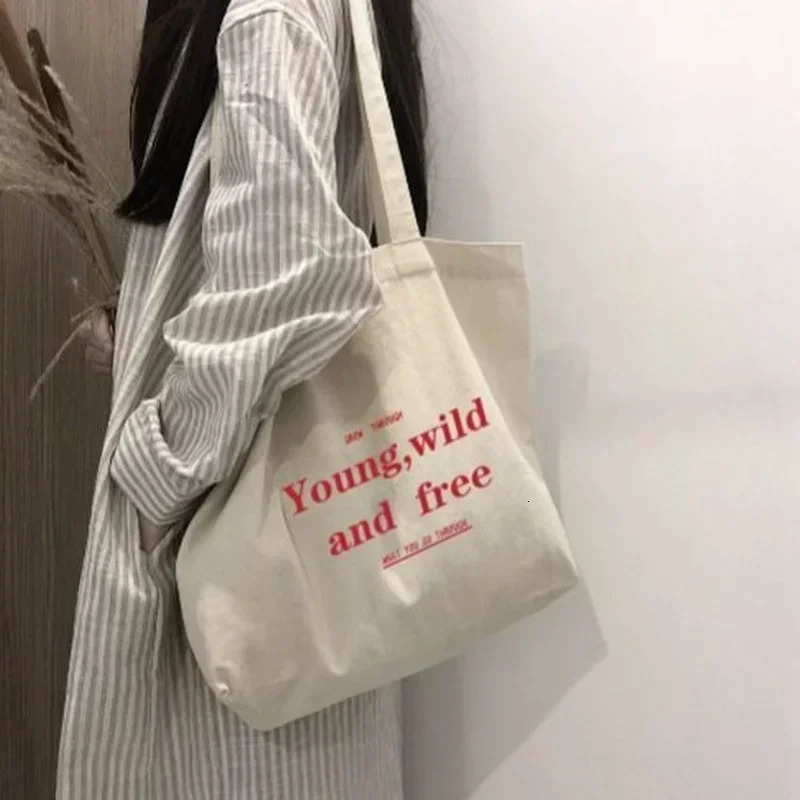 Womens casual large capacity shoulder bag shopping canvas letter fashion Harajuku zipper printing Ulzzang handbag 250311