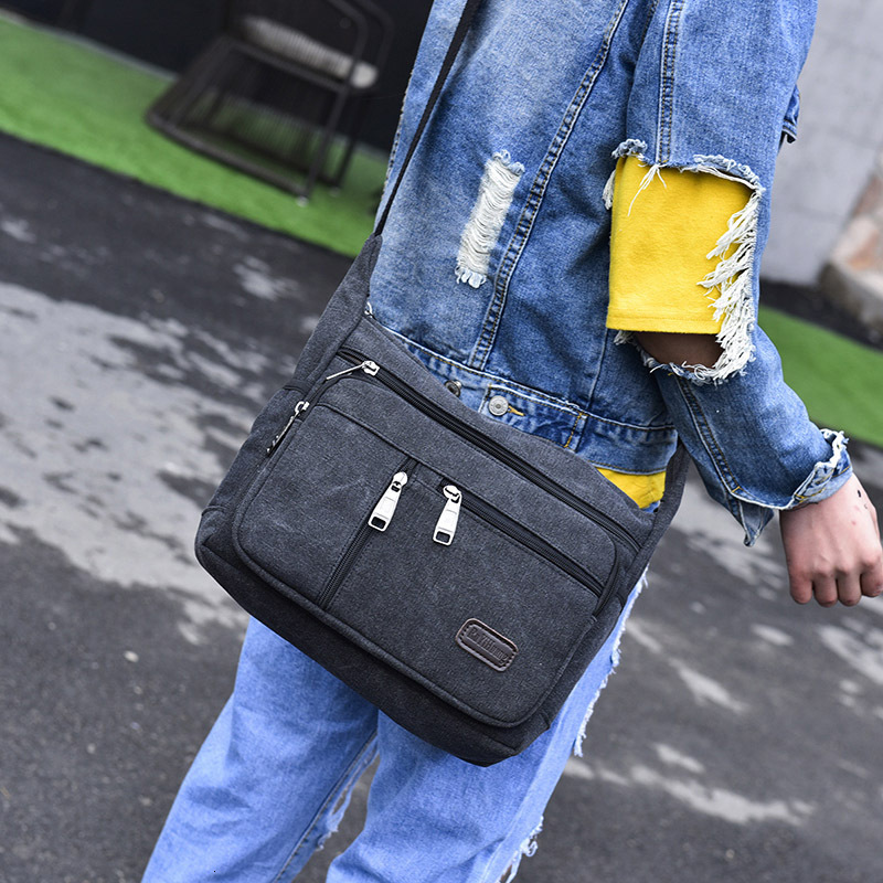 Fashionable and trendy backpack canvas shoulder with multiple compartments for leisure, large capacity men's crossbody designer