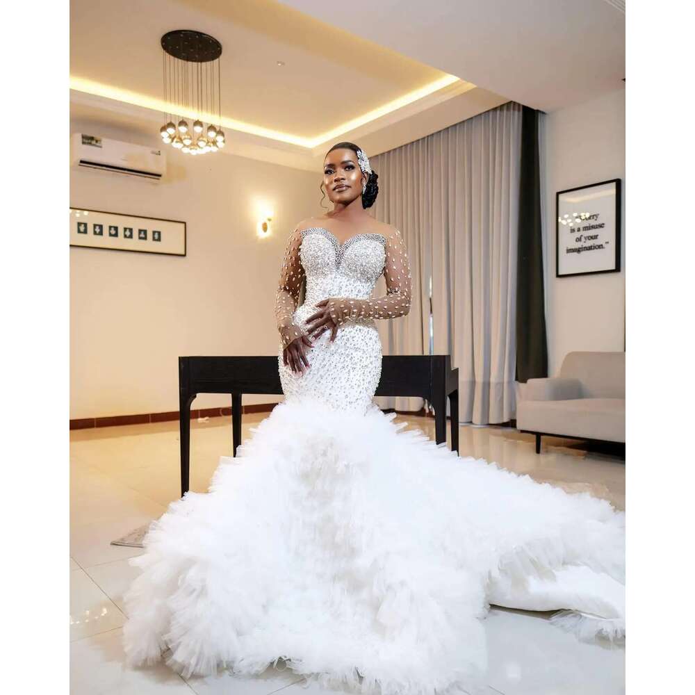 2025 Customized African heavy bright crystals full beads mermaid long sleeves layers tulle wedding dress for brides