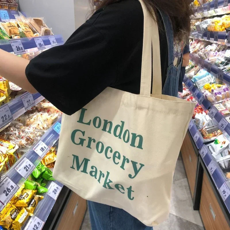 Womens casual large capacity shoulder bag shopping canvas letter fashion Harajuku zipper printing Ulzzang handbag 250311
