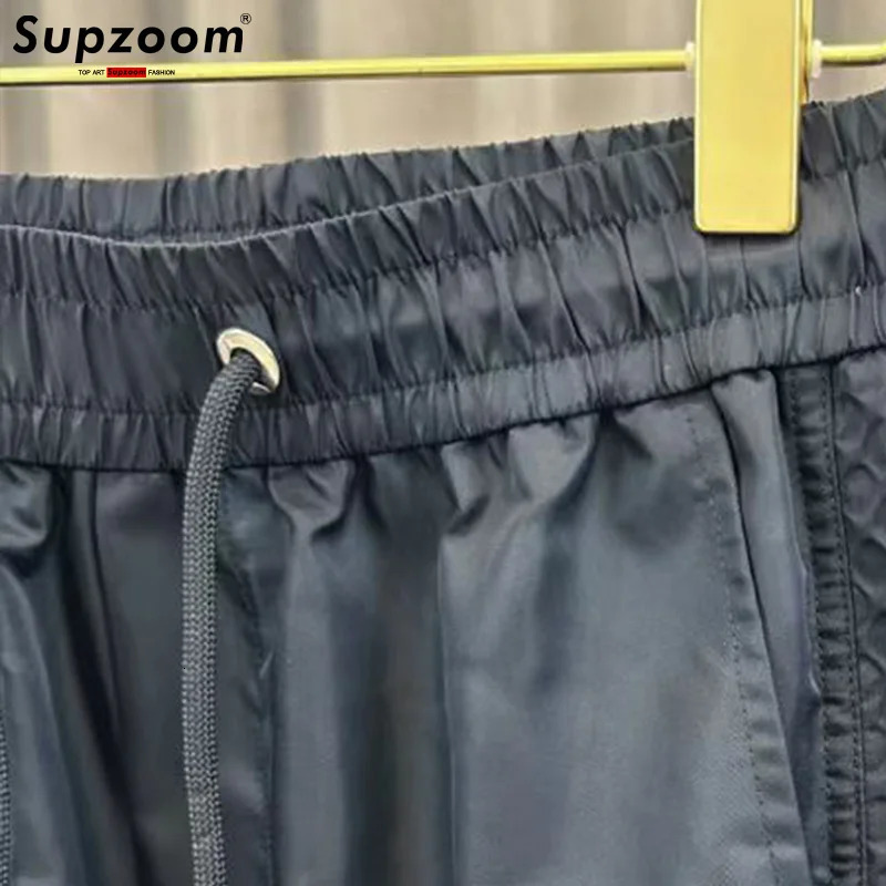 Supzoom has arrived at the top of fashion with a loose casual waistband for summer featuring street fashion mesh splicing pockets and personalized men