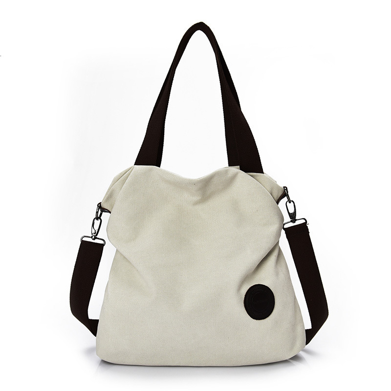 Leisure backpack simple and artistic canvas, hand-held single shoulder crossbody, women's large capacity multi compartment canvas designer bag