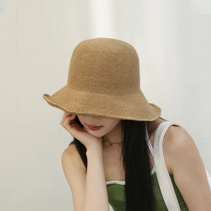 Foldable hand crocheted paper straw bucket hat suitable for womens summer sunshine breathable straw bucket hat 250314