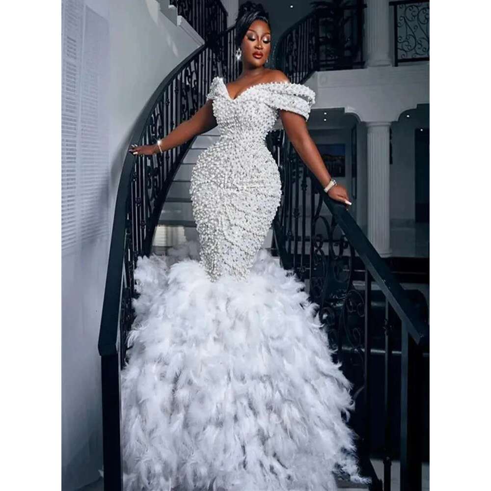 2025 Customized bright heavy handwork pearls trumpet dresses for bride off shoulder wedding dress of the with layers tulle