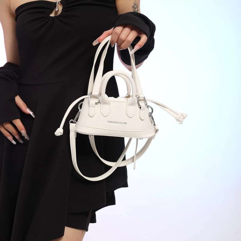 2025 new women's designer fashion trend handbag, youthful and cute crossbody bag, drawstring mini imitation denim2