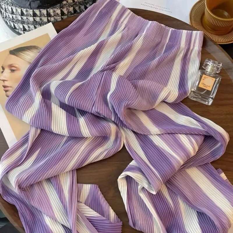 2025 new women's elastic high waisted tie dye contrasting color designer fashionable loose fast drying breathable commuting wide leg pants5