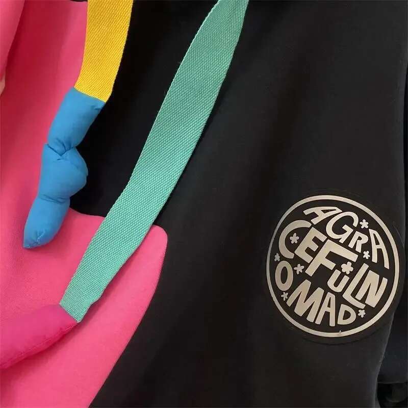 2025 New Korean Designer Fashion Plush Color Contrasting Hoodie Medium to Long Women's Coat5