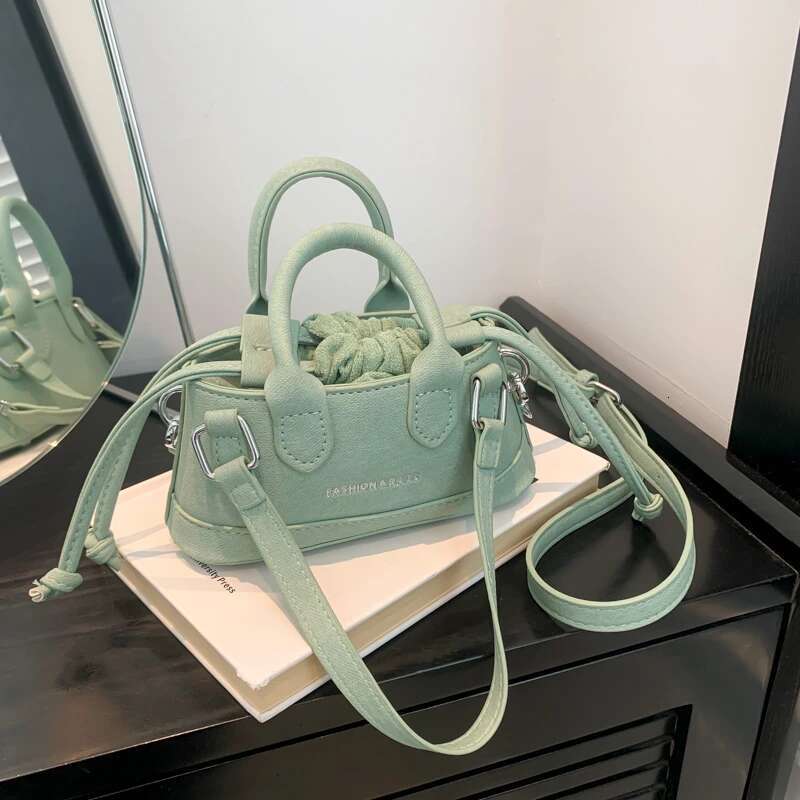 2025 new women's designer fashion trend handbag, youthful and cute crossbody bag, drawstring mini imitation denim2