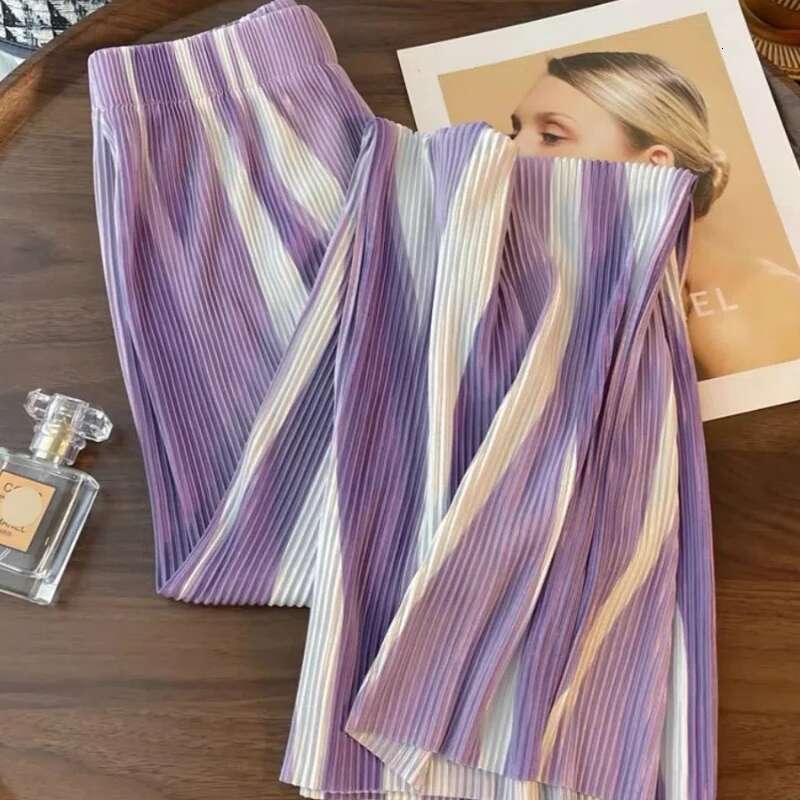 2025 new women's elastic high waisted tie dye contrasting color designer fashionable loose fast drying breathable commuting wide leg pants5