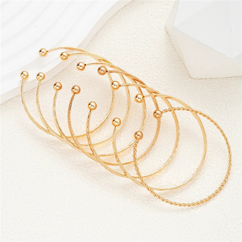 7 piecesset of punk retro gold bracelets suitable for female celebrities with heartshaped twists Exaggerated classic charm hiphop fashion jewelry 2503