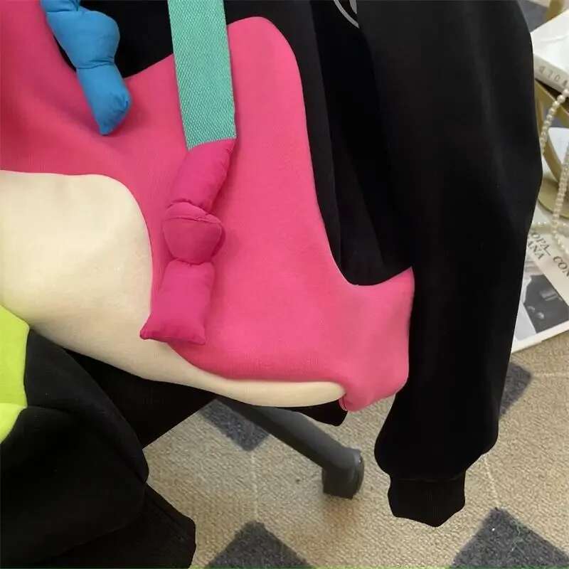 2025 New Korean Designer Fashion Plush Color Contrasting Hoodie Medium to Long Women's Coat5