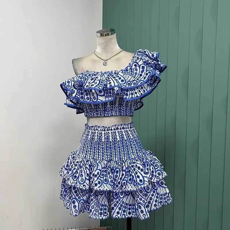Two Piece Dress New summer holiday 2-piece sexy womens shoulder embroidered pleated hollow cotton short top+cake mini ski suit Y250315O7NZ