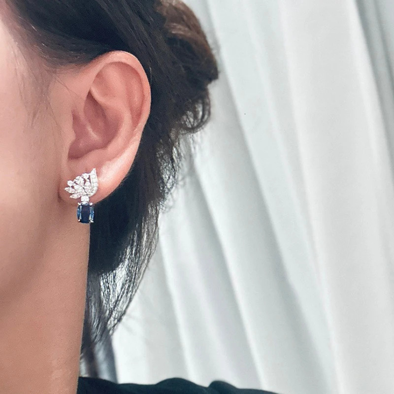 Trends Classic High Quality s Selling Jewelry Earrings Womens Pure Silver Horse Eye Stone Bow Knot 250314