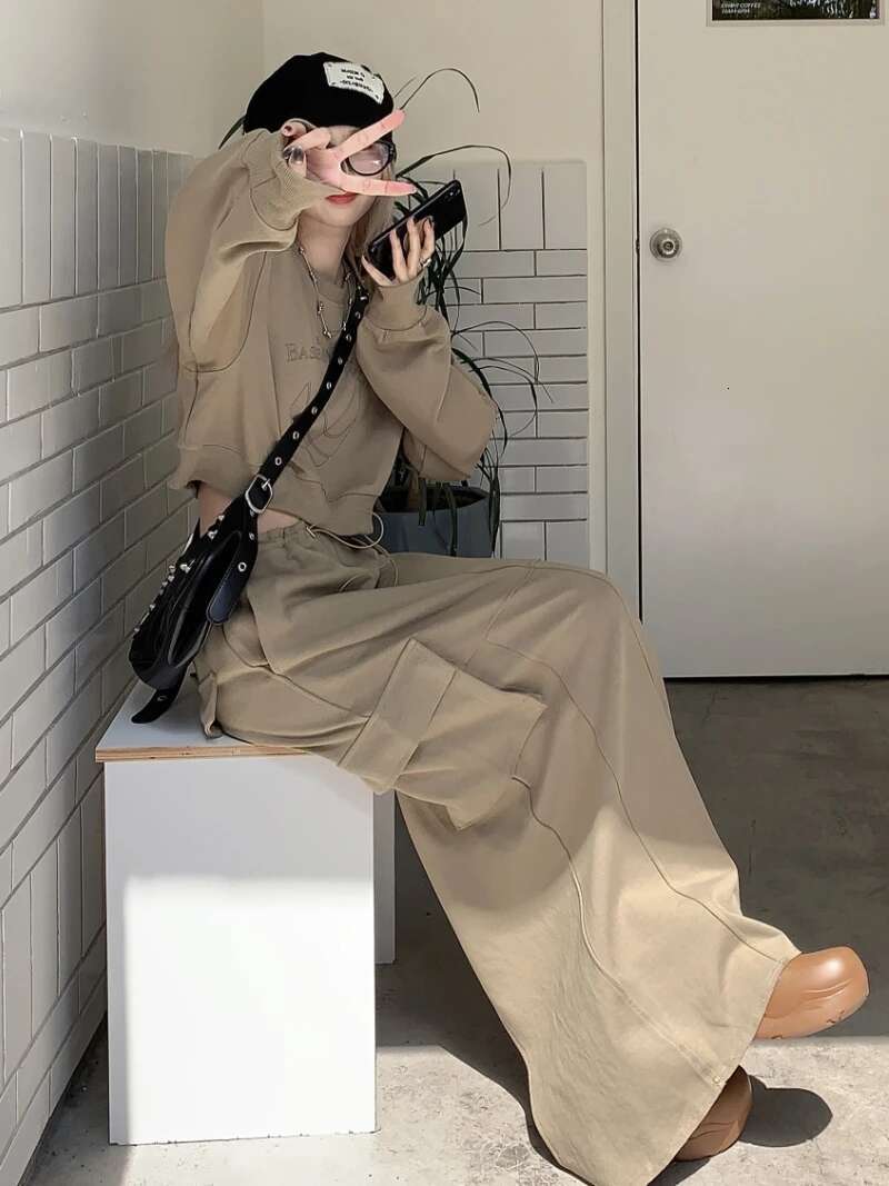 2025 New Retro Women's Designer Fashion Sleeve Printed Top Pocket Split Long Skirt Solid Color Two Piece Set for Women4