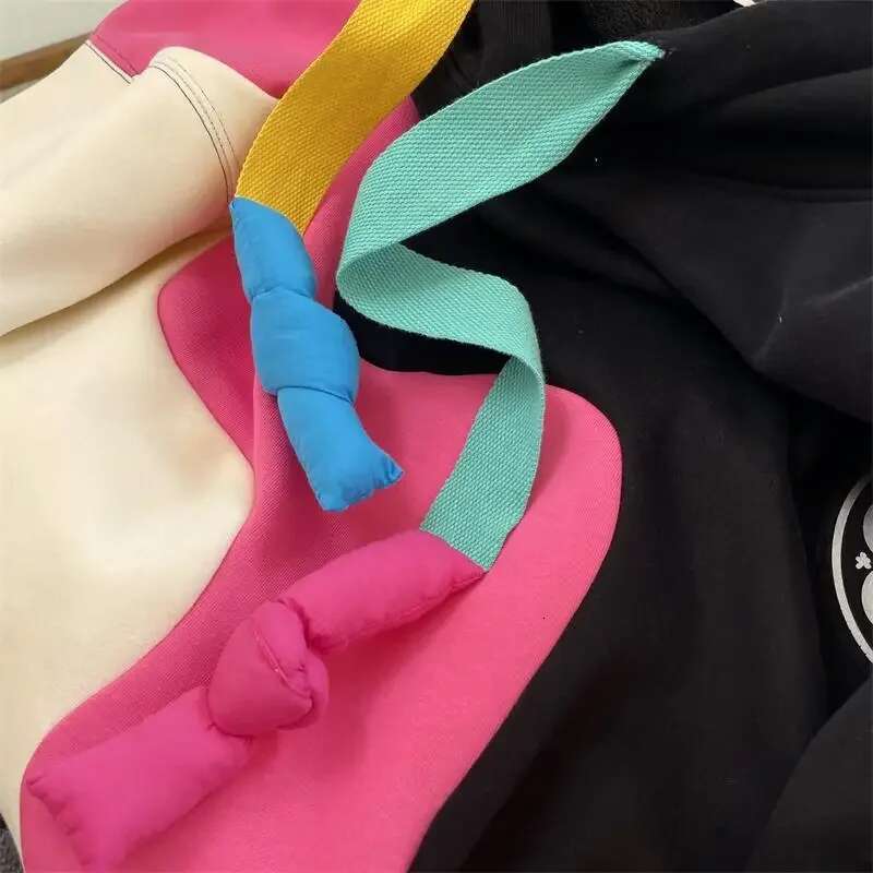 2025 New Korean Designer Fashion Plush Color Contrasting Hoodie Medium to Long Women's Coat5