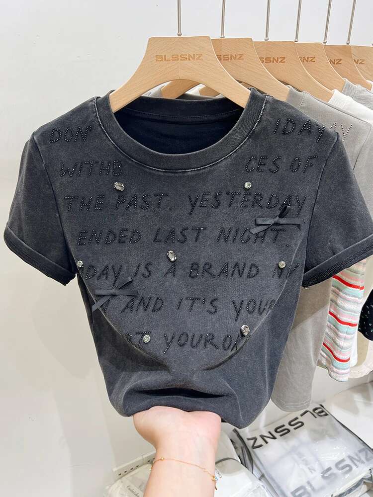 2025 New Women's Designer Fashion Heavy Embroidery Hot Diamond Letter Bow Round Neck Loose Short Sleeve T-shirt4