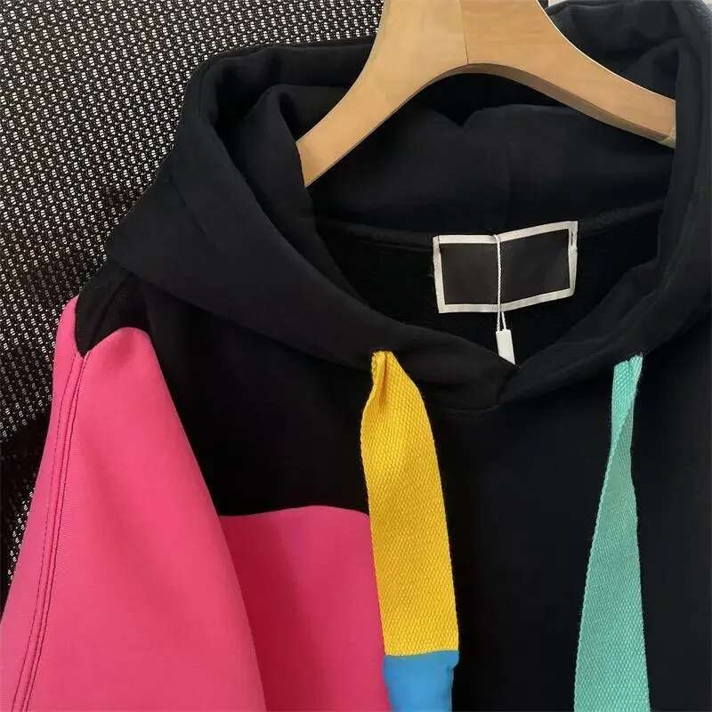 2025 New Korean Designer Fashion Plush Color Contrasting Hoodie Medium to Long Women's Coat5