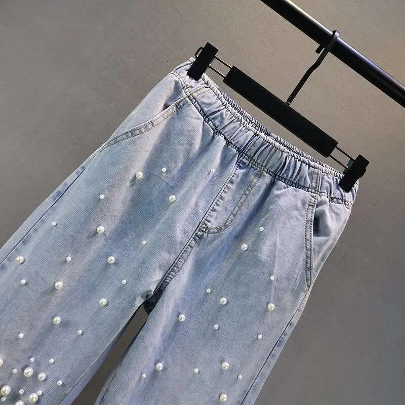 2025 new beaded denim designer fashion harem women's spring and summer pearl decoration elastic waist loose jeans fashion trend full pants4