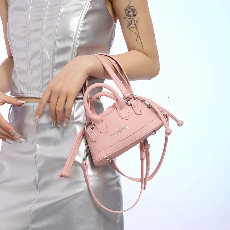 2025 new women's designer fashion trend handbag, youthful and cute crossbody bag, drawstring mini imitation denim2