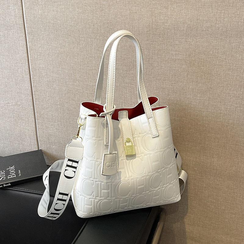 Classic New Embossed Stone Pattern Women's Solid Color Handbag Fashionable And Versatile Commuting Diagonal Cross Bag