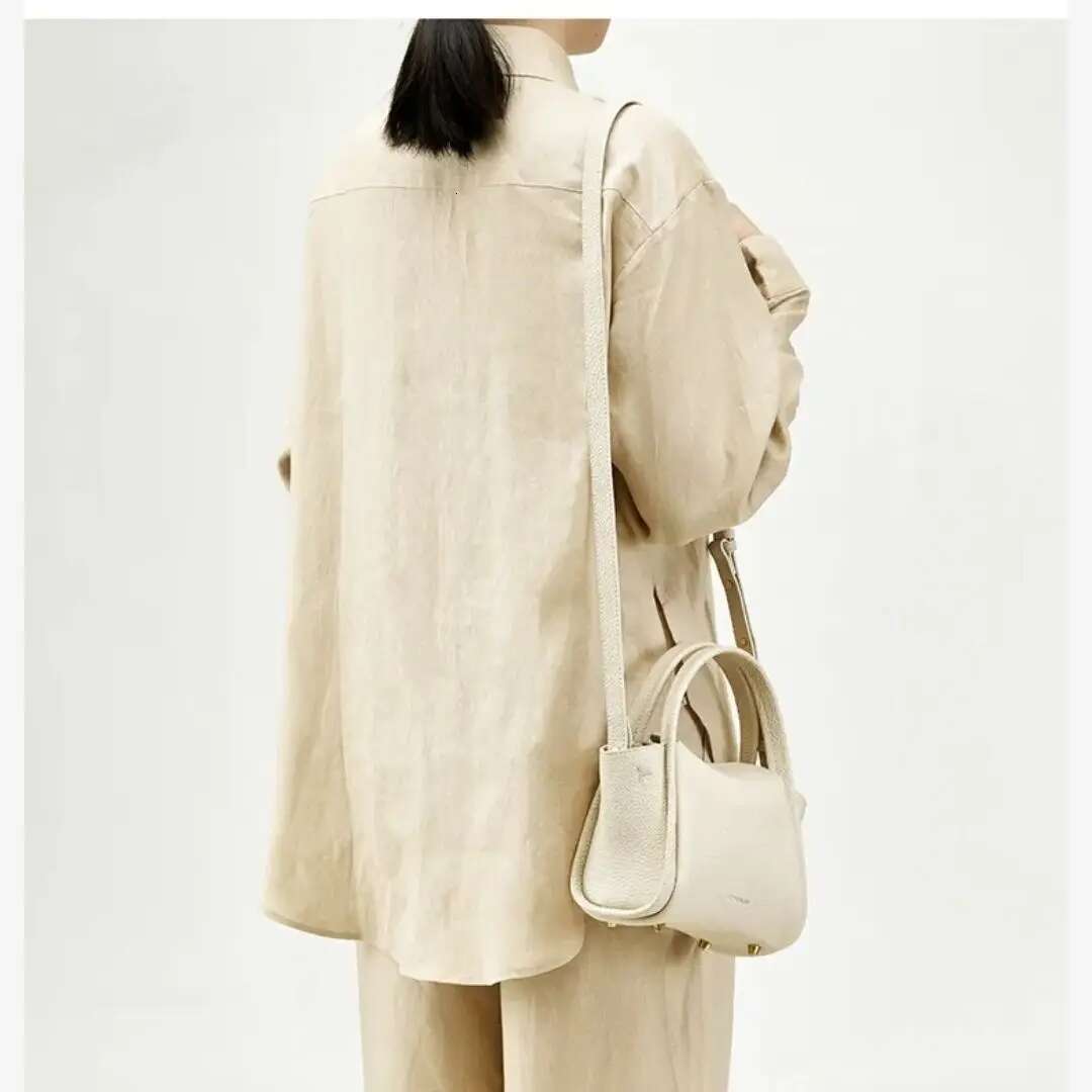 2023 New Women's Small Replica Cute Y2k Designer Minority Party Pink White Green Bucket Handbag Shoulder Crossbody Cloud Bag