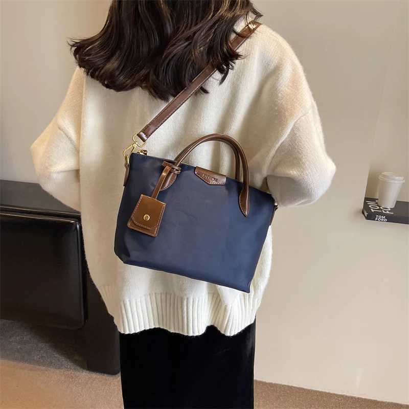 High quality brand top bag suitable for warm Oxford cloth mini Shoder shopping bag handbag with pendant 2024 designer luxury handbag Y250321