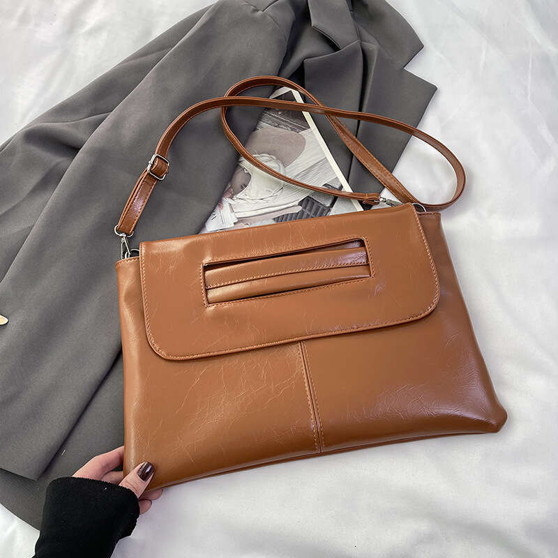 Korean version women's large capacity simple single shoulder diagonal cross hand-held grab bag envelope 2025 temperament versatile new trendy clo
