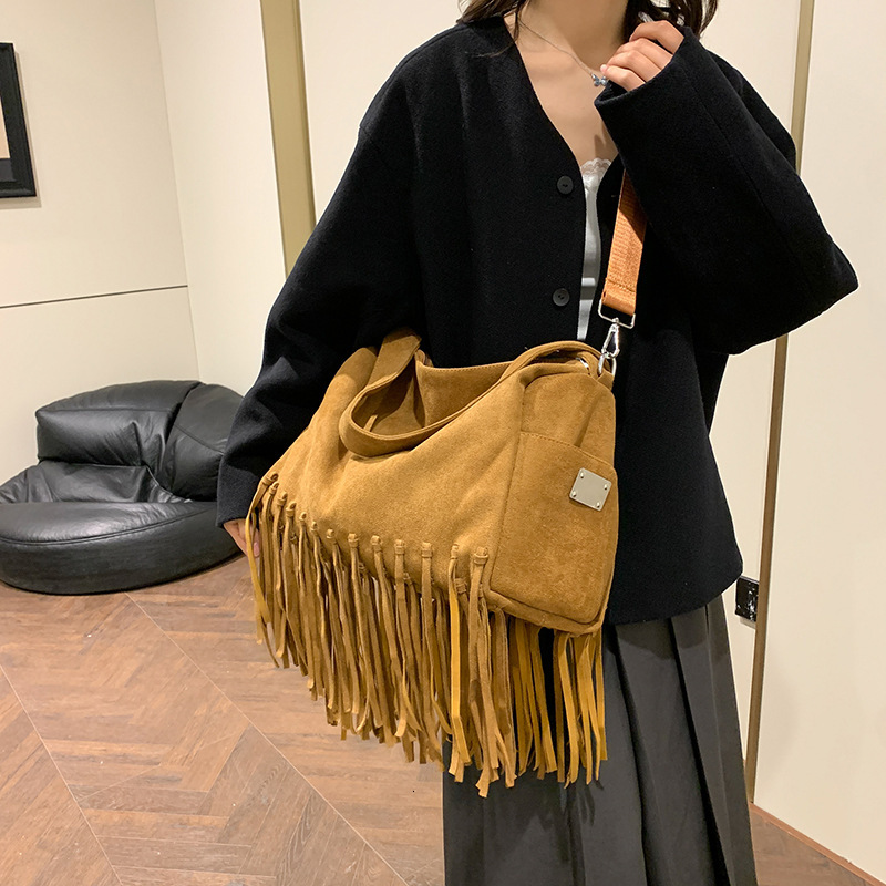2025 New Korean Fashion Tassel Shoulder Multi Functional Trendy Designer Crossbody Bag Off Road Large Capacity Motorcycle Square Bag Storage Bag Handb