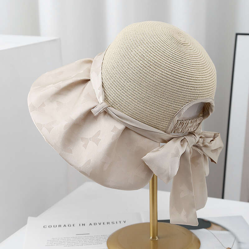 Elegant bow new style hat for women's summer travel, UV colored rubber beach sun hat, trendy