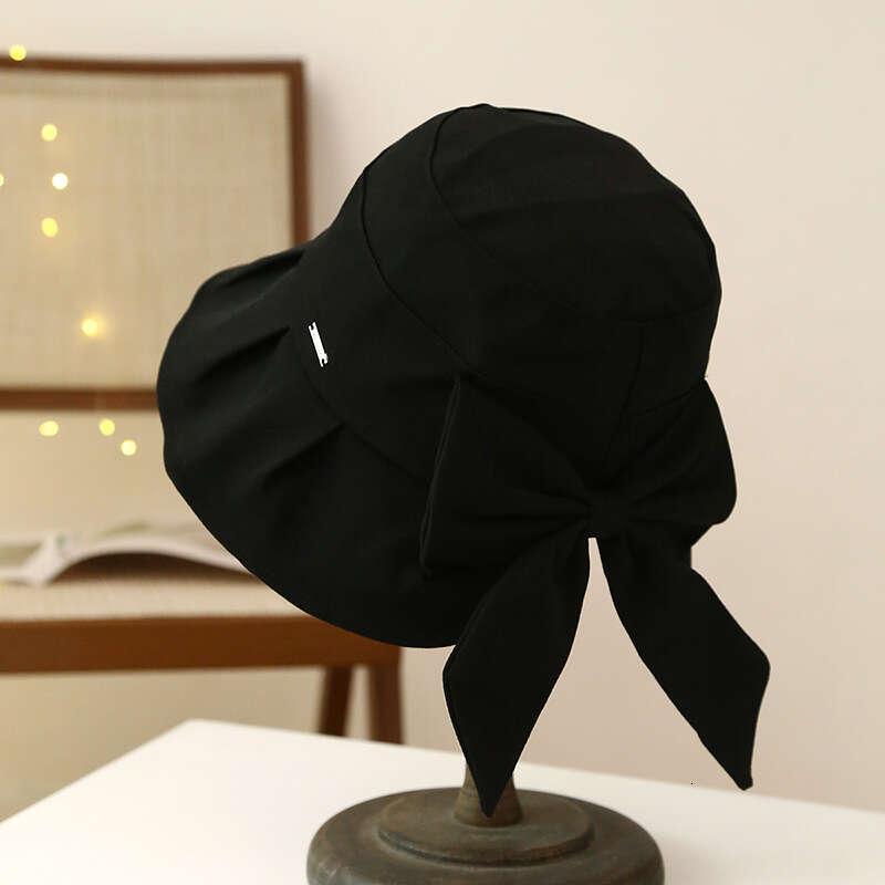 Spring and Autumn Sunscreen Women's Large brimmed UV resistant Fisherman's Hat, Korean Version Bow Casual Sun Hat