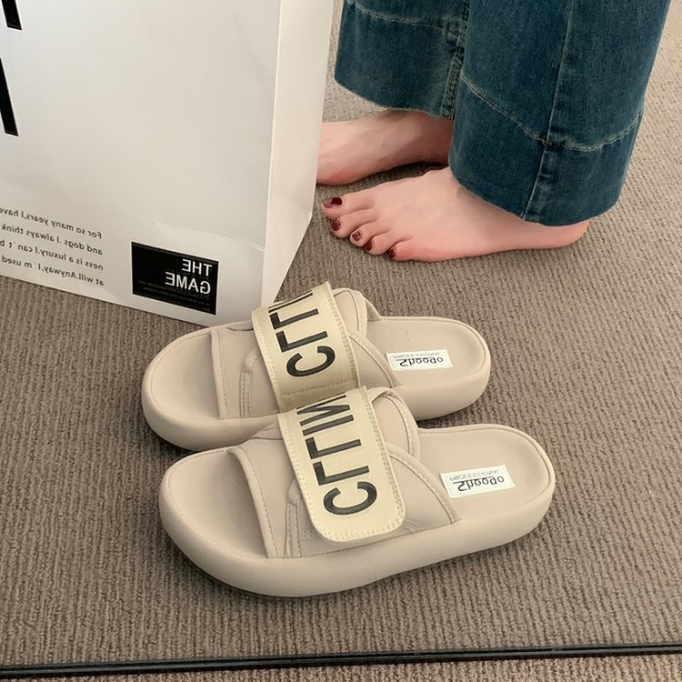 Korean version women's thick-soled one-word slippers new summer style soft sole with a feeling like stepping on poop non-slip beach sandals