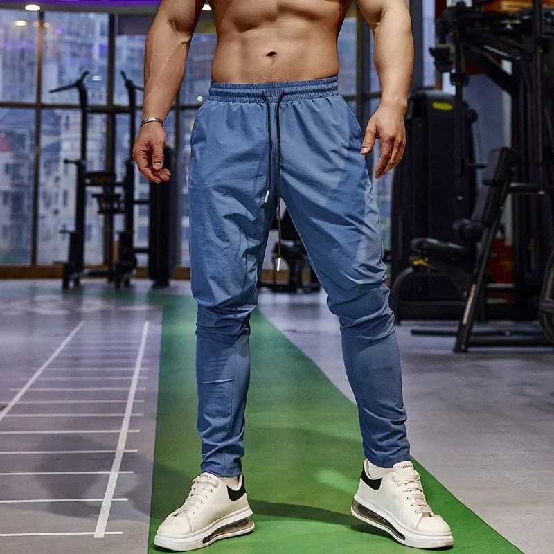 Pencil pants mens gym casual sports pants fishing pants breathable fast drying ice silk outdoor sports cycling jogging training W250318