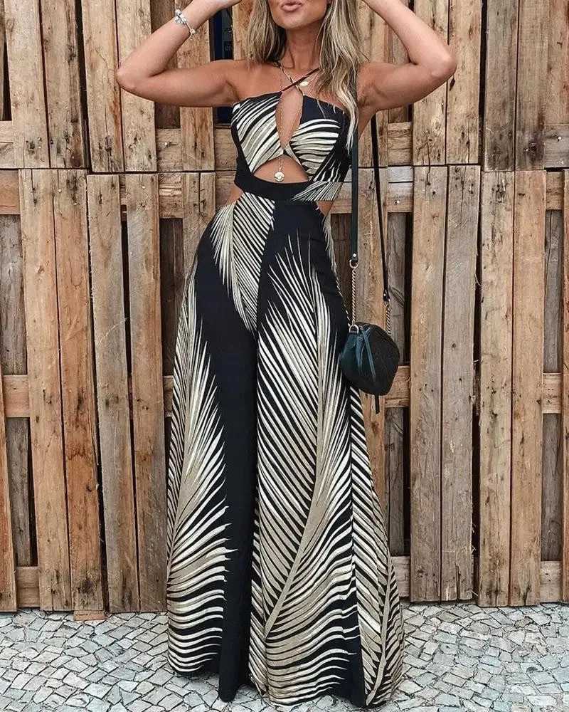 Womens jumpsuit 2025 spring/summer womens printed sexy backless hollow beach elegant womens hanging collar lace up pants jumpsuit X250318