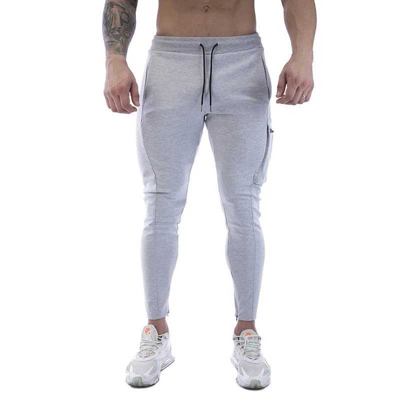 2023 new casual sports pants with elastic and breathable bottoms for mens running and training pants. Trousers fast drying gym jogging pants for runne