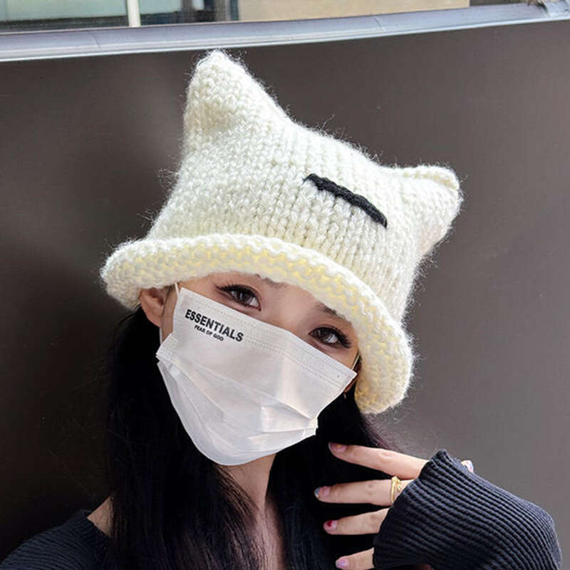 Korean version of new cute cat ear knitted wool for children's autumn and winter fashion, thickened warm hood, cold hat