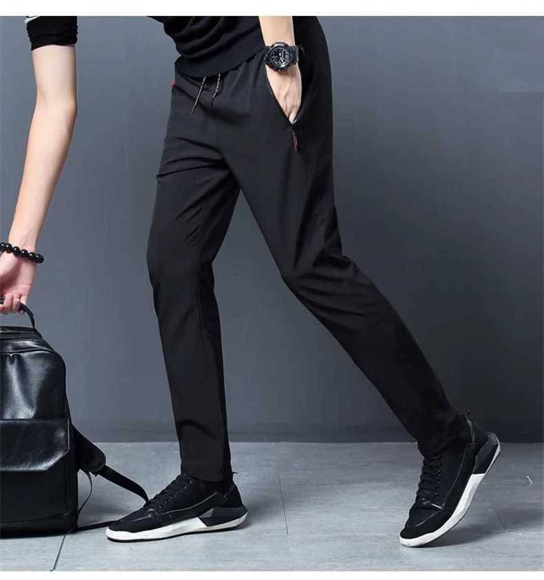 2025 Zipper Pocket Mens Casual Pants Straight Slim Fit Elastic Waist Jogger Korean Classic Blue Black Grey Mens Brand Trouser W250318