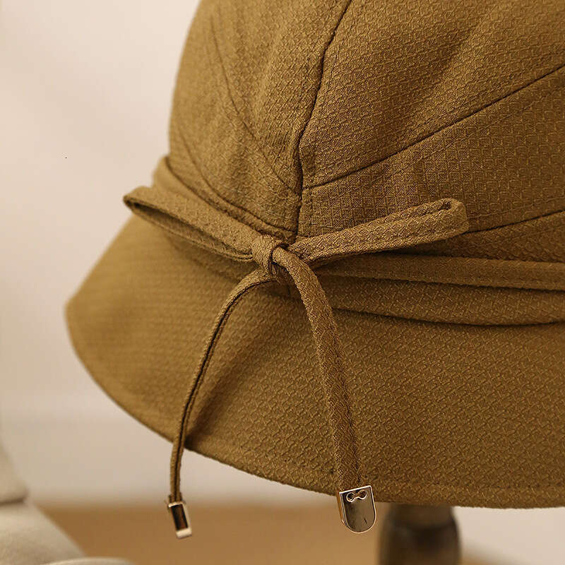 Hat children's Korean version lace up fisherman spring and summer temperament, rolled edge dome sunshade basin hat, looks small on the face
