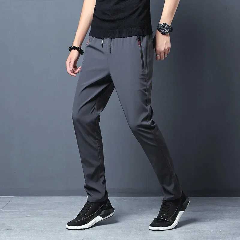 Summer new mens casual pants slim Korean ice silk pants gold round thin sports pants straight tube fast drying jogging pants W250318