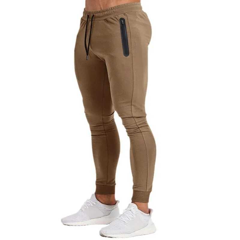 European and American spring and summer new solid color lightweight fitness pants casual elastic sports pants mens fashion trend W250318