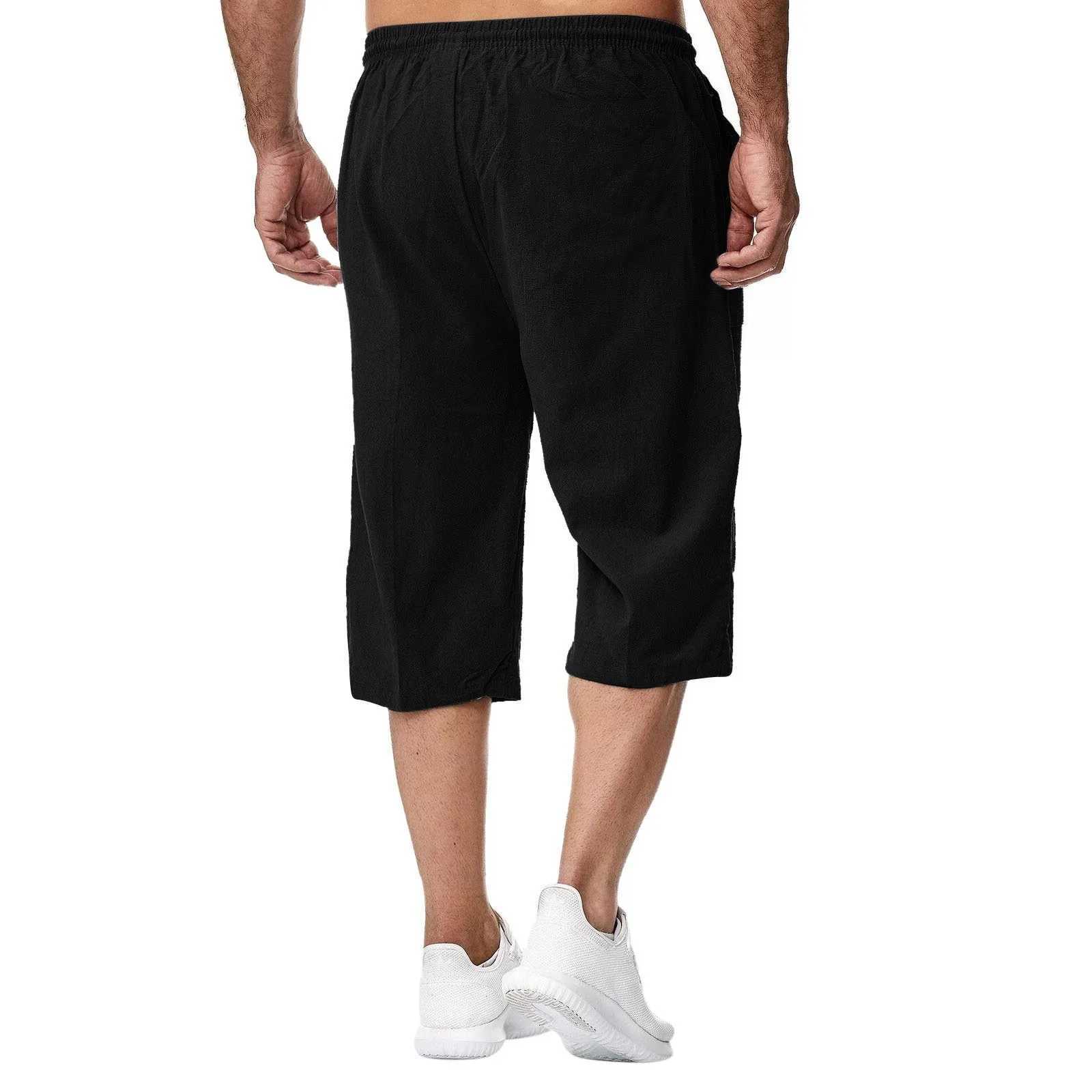 Mens casual shorts solid color sports knee length elastic waist breathable wide leg seven point mens holiday pants W250318