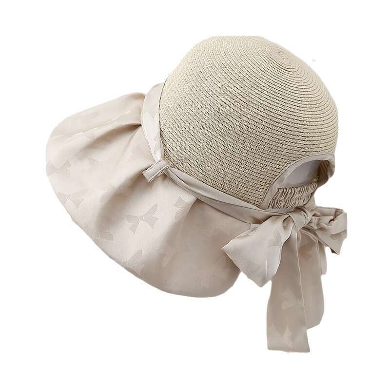 Elegant bow new style hat for women's summer travel, UV colored rubber beach sun hat, trendy