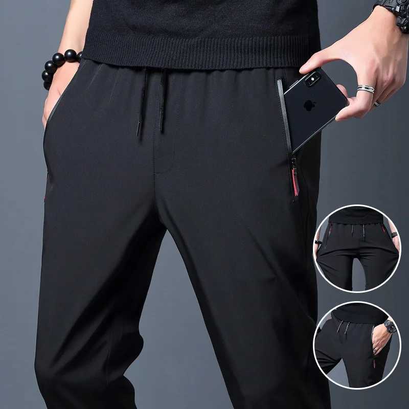 2025 Zipper Pocket Mens Casual Pants Straight Slim Fit Elastic Waist Jogger Korean Classic Blue Black Grey Mens Brand Trouser W250318