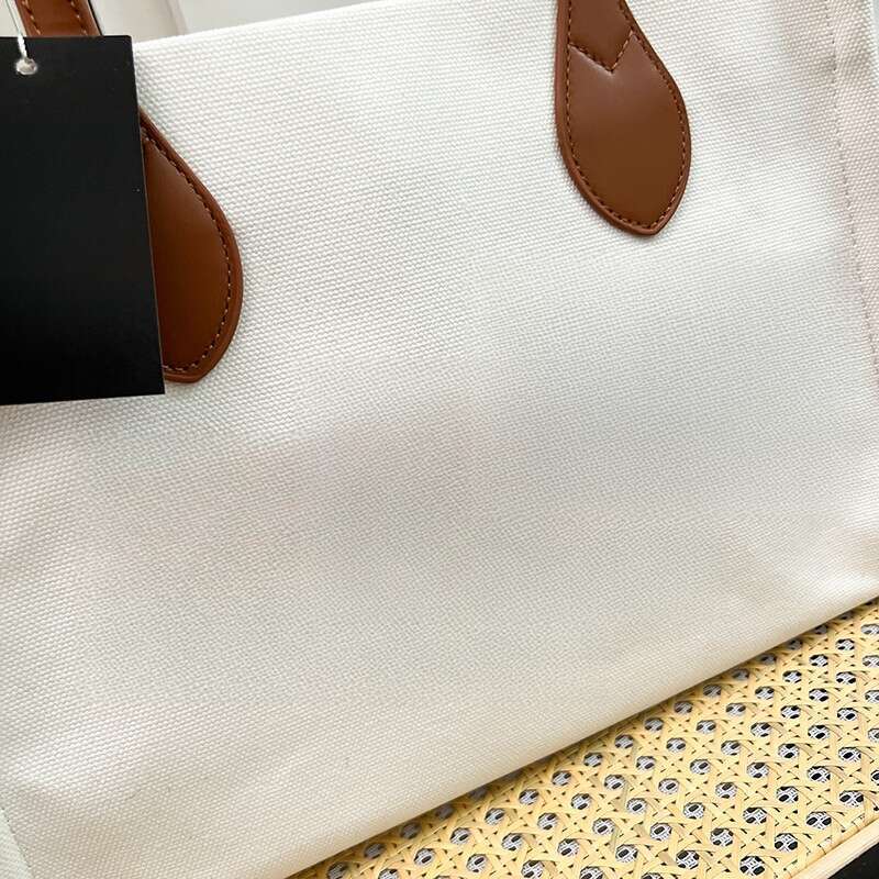 Wholesale new high-quality shoulder bags, large capacity commuting tote bags, versatile hand-held women's bags
