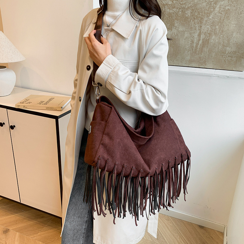 2025 New Korean Fashion Tassel Shoulder Multi Functional Trendy Designer Crossbody Bag Off Road Large Capacity Motorcycle Square Bag Storage Bag Handb