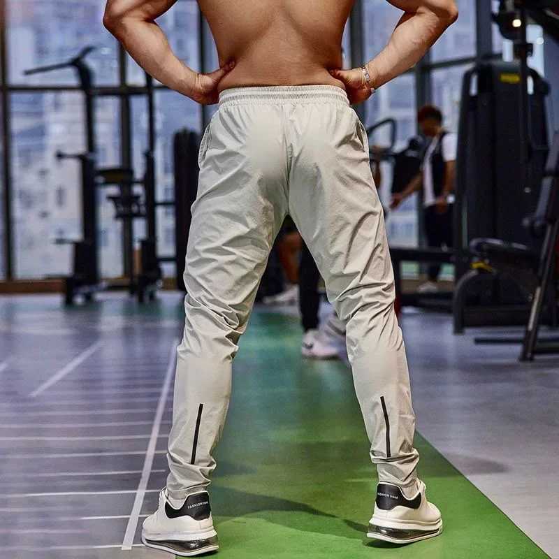 Pencil pants mens gym casual sports pants fishing pants breathable fast drying ice silk outdoor sports cycling jogging training W250318