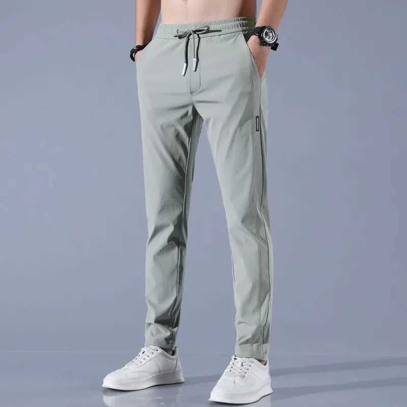 2025 Ice Silk Mens Pants Summer New Black Gray Thin Business Casual Pants Outdoor Elastic Breathable Straight Leg Sweatpants W250318