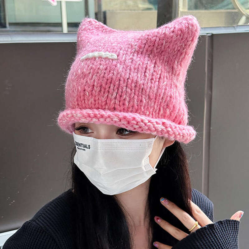 Korean version of new cute cat ear knitted wool for children's autumn and winter fashion, thickened warm hood, cold hat