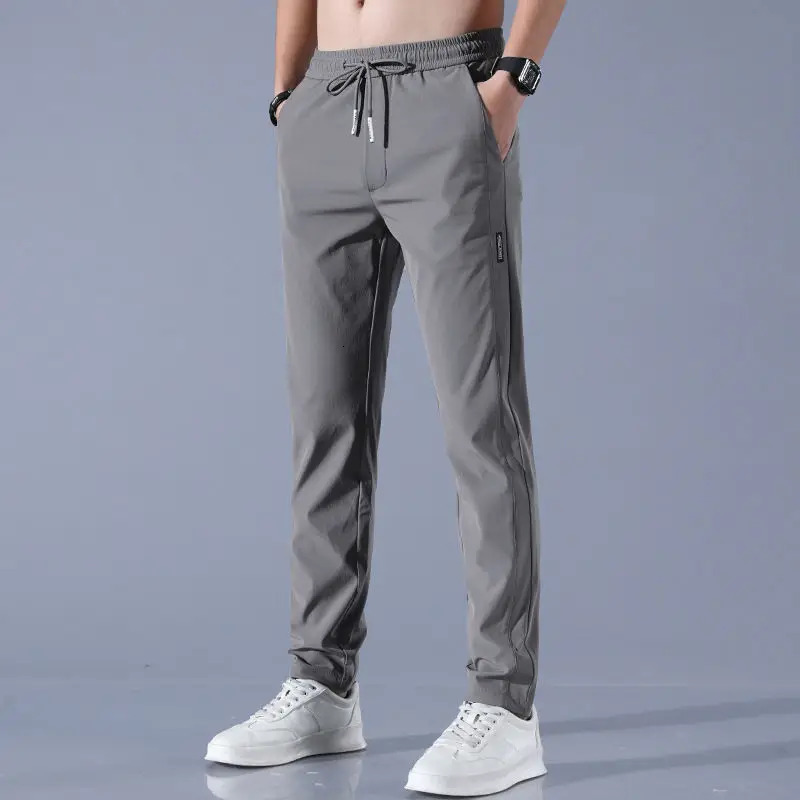 Straight tube ice silk pants for mens business trend sagging casual pants summer thin wide leg pants youngsters 250318