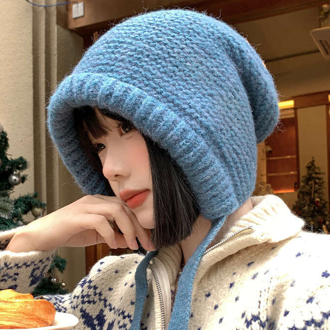 Solid color balaclava women's winter Korean version ear protection and cold proof woolen thickened warm knitted hat