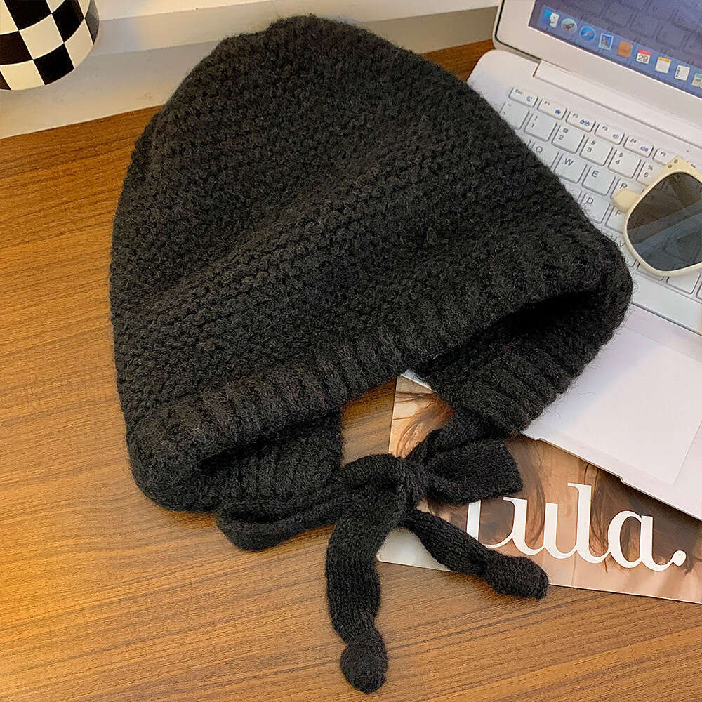 Solid color balaclava women's winter Korean version ear protection and cold proof woolen thickened warm knitted hat